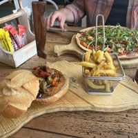 Vegan pizza and burger   at Temptations in Menorca