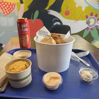 A “small” bucket with some sparkling watermelon water   at Herbie Butcher's Fried Chicken in Minneapolis