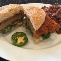 Inferno Chicken Sandwich. Sub Bacon Baked Beans for Tots. Add 6 jalapeno coins. So good even when eaten 30 minutes after pick up, or the next day as leftovers. at Herbie Butcher's Fried Chicken in Minneapolis