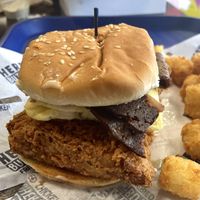 Dragon Dusted Chicken with JUST Egg, mayo, HB queso, and 2 strips HB bacon. Really tasty💚  at Herbie Butcher's Fried Chicken in Minneapolis