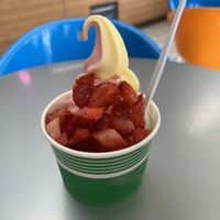 Pineapple Watermelon swirl with fresh strawberries   at Beach Treats Ice Cream and Frozen Yogurt in Myrtle Beach