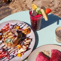American pancakes, hummus wrap, oat coffee and a cold pressed juice  at Blossom in Leiden