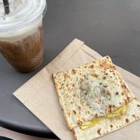 Vegan flatbread and oat milk foam cold brew  at Peet's Coffee in Chicago