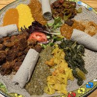 Vegetarian platter, with Tempeh tibs order on same platter. Tibs, spicy red lentil, and chickpea dishes were favorites.  at Addissae in Asheville