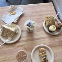 Jalapeño pretzel dog, focaccia, lemon cupcake, blueberry muffin, 3 layer coconut cake, chai tea  at New Moon Vegan in Batavia
