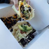 6/23/21 vegan tempeh tacos overflowing with goodness! Sides were coconut purple rice and bean & corn salad.  at Astoria Coffeehouse & Bistro in Astoria