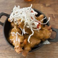 Vegan Chicken Wings with Saté-Chilly sauce and rice noodle topping   at Utter Waffle in South East London