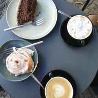 Biscoff bun, coffee cake and cappuccini (one with whipped cream) at Calm Coffee in Berlin