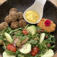 Falafel with quinoa salad, hummus and vegan mayonaise  at Bookeria in Rovinj