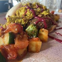 Crumbed Portobello Muffin with tofu scramble   at Crave Cairns in Cairns