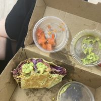 Scrambled tofu burrito with added hashbrown  at Crave Cairns in Cairns