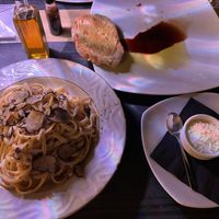 Truffle Linguini, Garlic bread and a side of vegan parm. ALL 100% vegan and 100% delicious!  at Artisti in Corfu