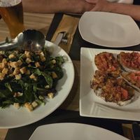Italian bruschetta and the restaurant's special salad at Artisti in Corfu
