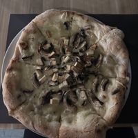 Vegan carbonara pizza with smoked tofu and mushrooms   at Artisti in Corfu