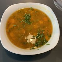 Sambar (indische Linsensuppe) mit Kartoffeln, Tomaten und Tamarinde at Sattva Vegan in Vienna