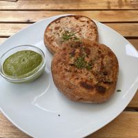 Appetizer, bread filled with lentils and chutney  at Sattva Vegan in Vienna