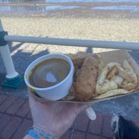 Vegan chips, curry sauce and battered sausage   at Beachcliff Fish & Chips in Penarth