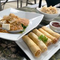 Crispy Spring Rolls, Classic Thai Vegan (pan-fried spinach and tofu with delicious peanut sauce), and brown rice. at My Thai in San Luis Obispo