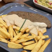 Seitan with sauce and fries  at Contracorriente in Ourense
