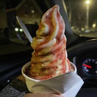 Vanilla oatmilk soft serve with strawberry and caramel sauce OMG!  at Vaca's Creamery in Chicago