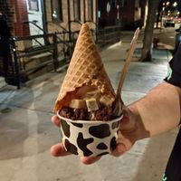 Vanilla soft serve, cookie dough, brownie bites, and a waffle cone on top at Vaca's Creamery in Chicago