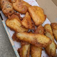 Battered sausage, miso tofu and gherkins at Beach Buoys in Margate