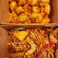 Pad thai with vegan shrimp and vegan orange chicken at Veggie Village in Chandler