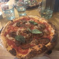 Parmigiana party pizza and my partner got the pesto one, both so good!  at Purezza in Manchester