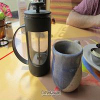 My charming coffee press and great earthenware mug. at Eco-Goddess in Carbondale