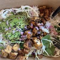 Rice Box: coconut rice, avocado, greens and cabbage, blackened tofu. Came with a side of tamari.  at Timoti's Seafood Shak in Ponte Vedra Beach