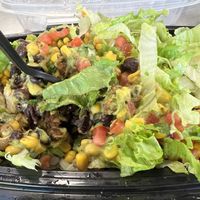 rice beans corn lettuce guac pico & chorizo   at Bubbakoo's Burritos in Stafford