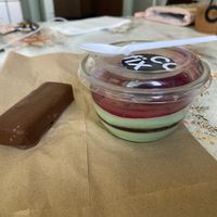 A vegan chocolate peanut bar and vegan pistachio mousse  at Cofix in Moscow