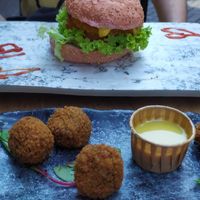 Bitterballen with honey mustard sauce and crispy chicken burger at Vegan Temple Bar in Amsterdam