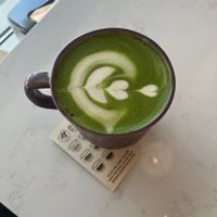 Matcha latte above at Whisk Matcha Cafe in Vancouver
