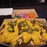 Vegan chilli cheese fries + pickled veggies   at The Vanguard in Milwaukee