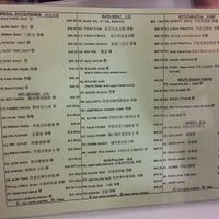 menu (see Jain and Vegan symbols) at Sharmaji Indian Veggie Restaurant in Kowloon