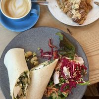 Butterbean pesto vegan feta wrap, pat flat white & vegan almond croissant 👌  at The Fold in Worcester