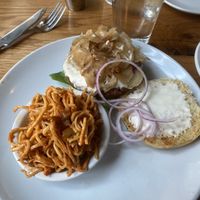 5/5 veggie burger with added onions and vegan cheese soooooo good. The kimchi ramen was 3/5    at Laughing Seed Cafe in Asheville