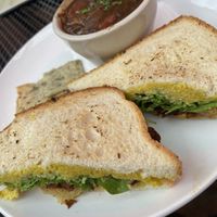 Grilled cheese with arugula, local apple butter, caramelized, onions, and shiitake bacon. With black bean and sweet potato soup! It was phenomenal    at Laughing Seed Cafe in Asheville