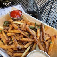Fries with jalapeños and onions  at Laughing Seed Cafe in Asheville