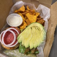 Seed burger with sweet potato chips at Laughing Seed Cafe in Asheville
