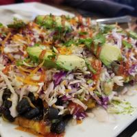 Vegan Tostones with black beans at Arepitas in Round Rock