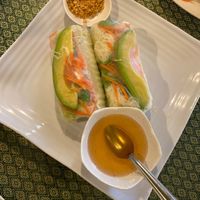 Fresh rolls with avocado - we ate two already!  at Thai Basil in Visalia