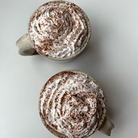 Hot chocolates with vegan whipped cream  at FIKA Dundee in Dundee