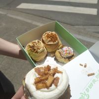 4 cinnamon rolls: apple, almond & pistachio, speculoos (Biscoff) & rainbow sprinkles (for pride month) at Have a Roll in Antwerpen