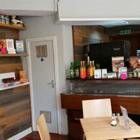 reception and small store at Govinda's Cardiff in Cardiff