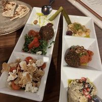 The appetizer combo the top and bottom left are not vegan but the other four are (all are veg)  at DishDash in Sunnyvale