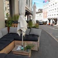 Outdoor seating at Kaffeehaus zu den Drei Herzen in Einsiedeln