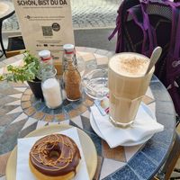 Hazelnut donut and chai tea latte at Kaffeehaus zu den Drei Herzen in Einsiedeln
