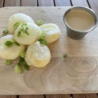 Yuca bites.  A bit bland but the sauce was delicious.  at Holi Vegan Kitchen in Hallandale Beach